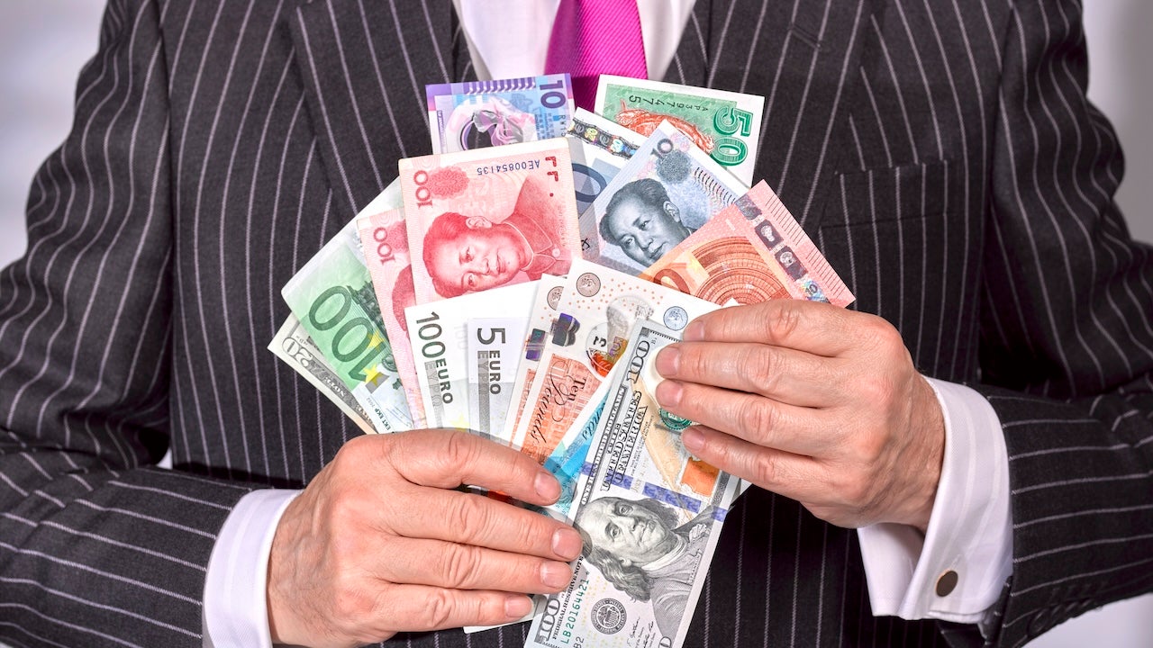 instant local currency payout global team